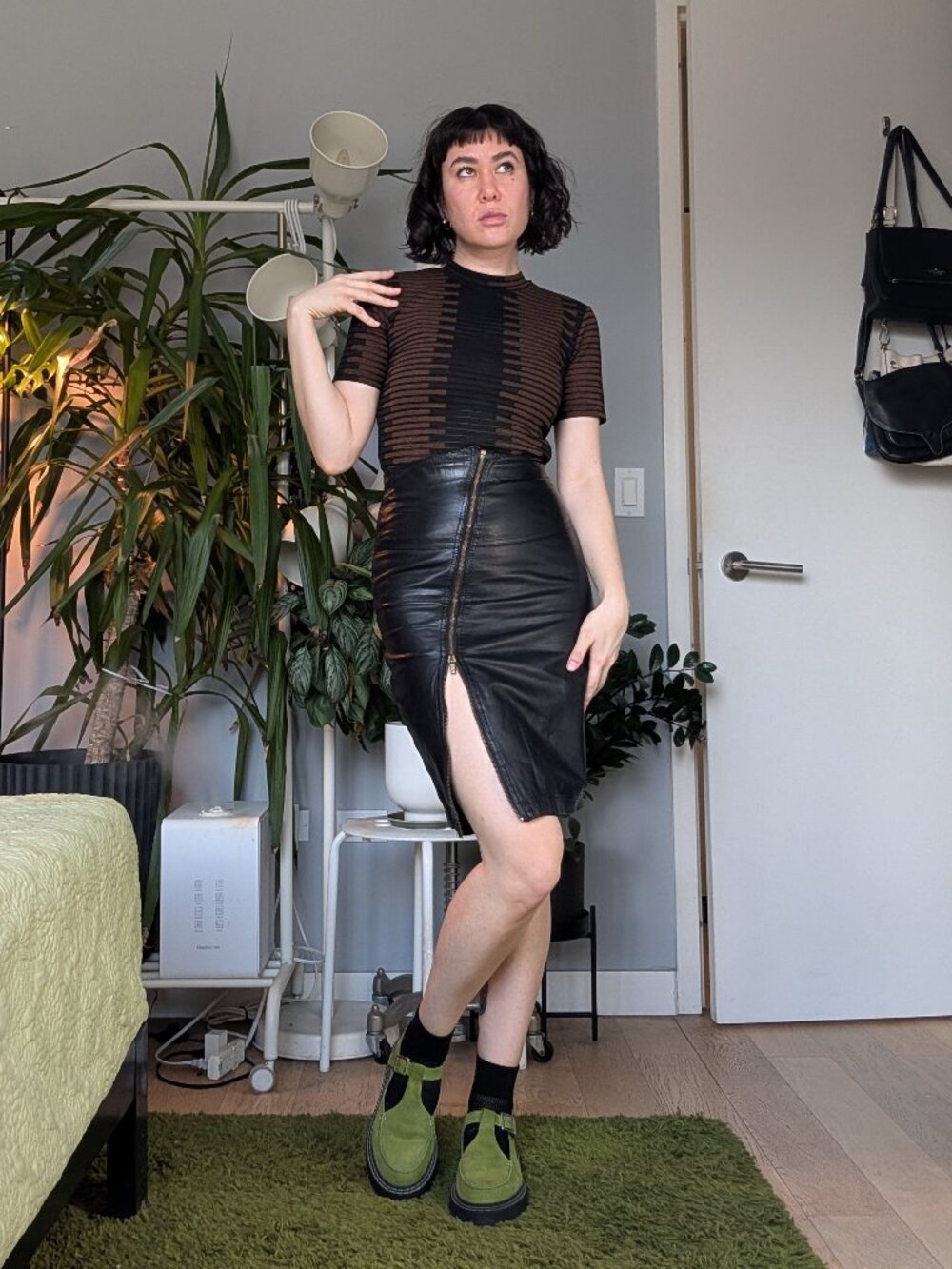 VINTAGE leather skirt with front zipper, estimated size small
